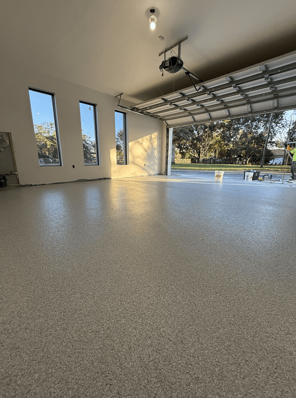 Residential garage with light flake epoxy