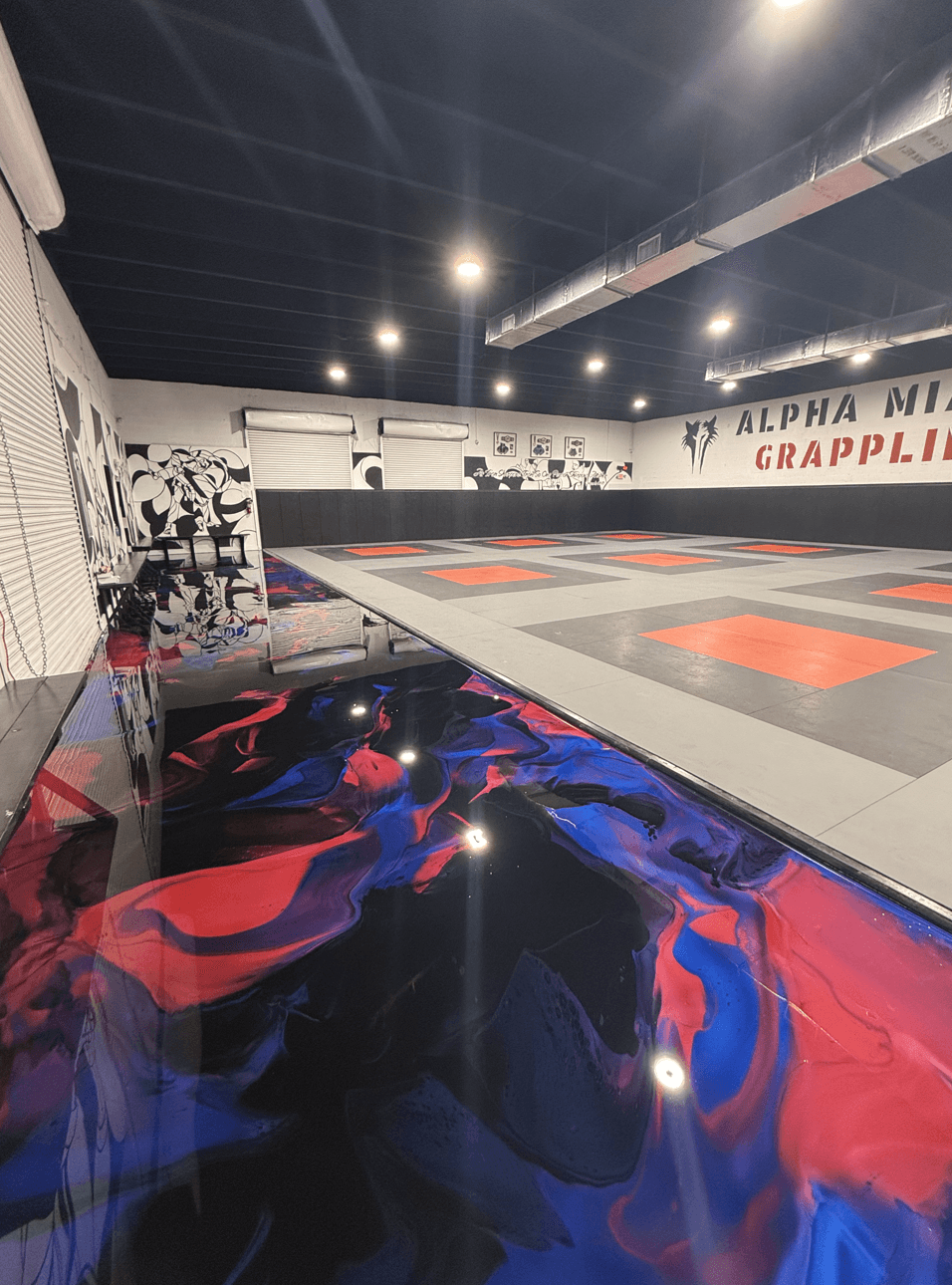 Red and blue metallic epoxy with abstract design