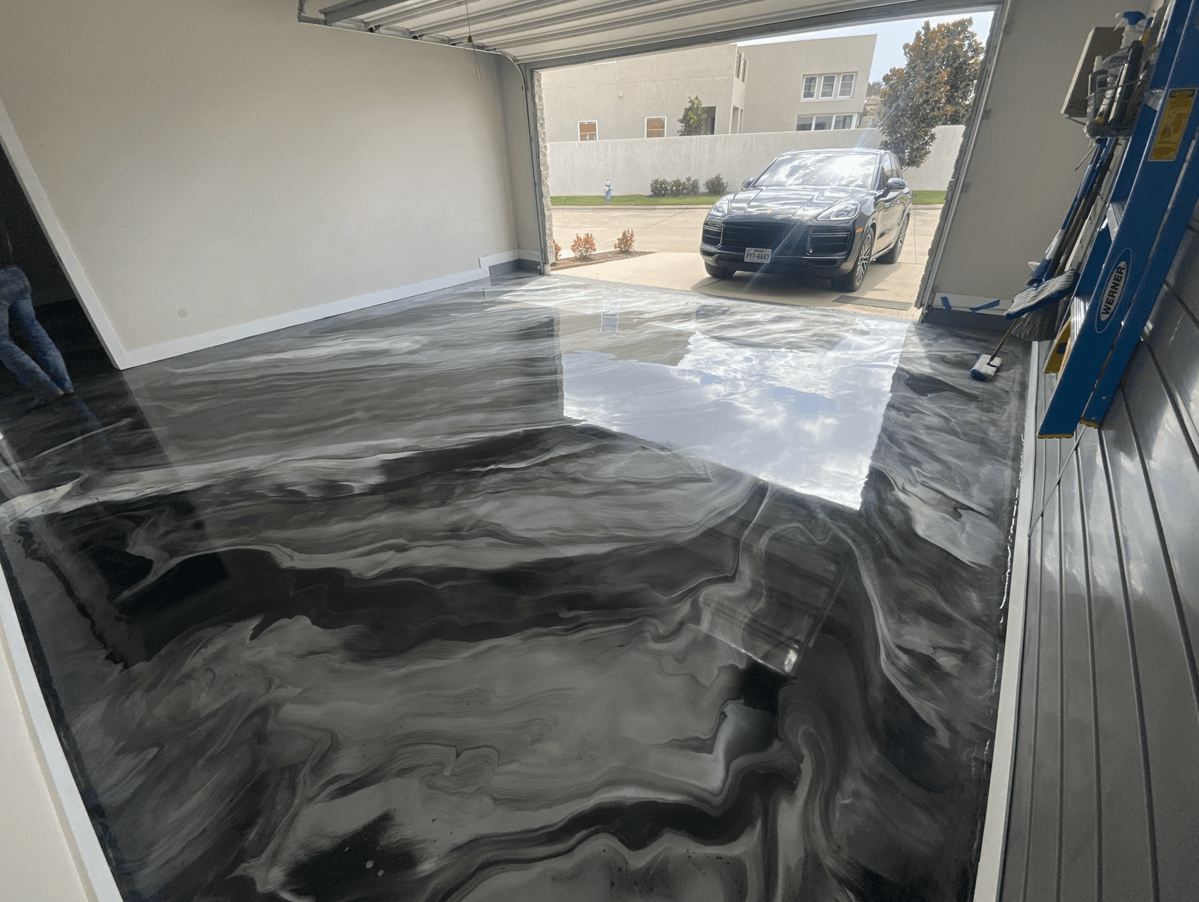 Black and white marble effect garage floor